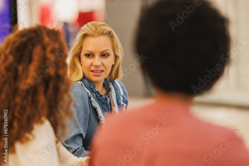 Female Friends In A Shopping Mall