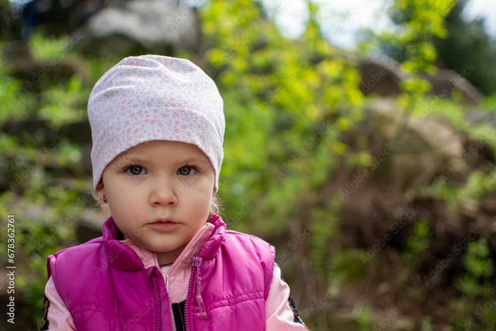 Little girl with incredible beautiful eyes and long drawings