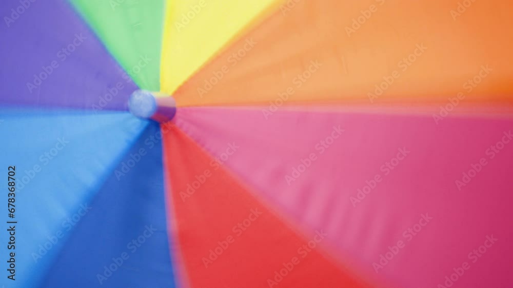 Capture joy on gloomy days with our big rainbow umbrella. Watch it spin in a whirlwind of lively LGBT colors, bringing radiance to overcast skies and wet weather Capture joy on gloomy days with our big rainbow umbrella. Watch it spin in a whirlwind of lively LGBT colors, bringing radiance to overcast skies and wet weather
