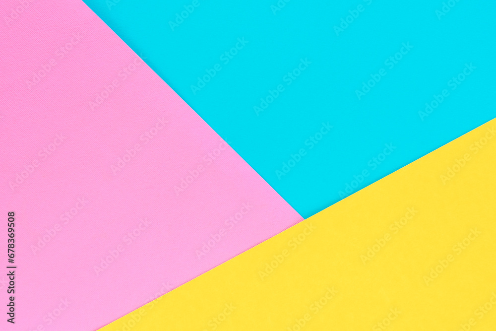 Yellow, pink and purple colored paper. Geometric empty paper background of three tones for copy space