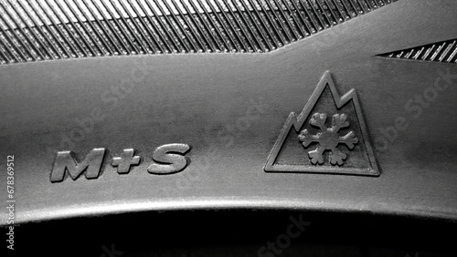 Designation of winter tires. Three-mountain snowflake symbol. 3PMSF symbol on the side of the tire.