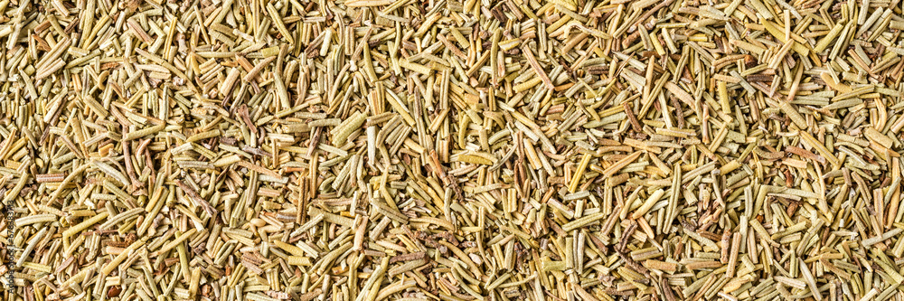 Dried rosemary texture. Background with copyspace. Close up. Top view