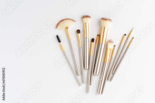 Makeup brushes set isolated on white background. Top view