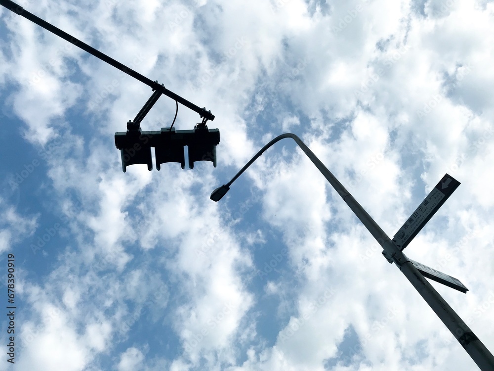 traffic lights and the blue sky with clouds traffic lights and the blue sky with clouds