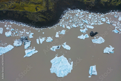 Aerial view of glacial ice on river photo