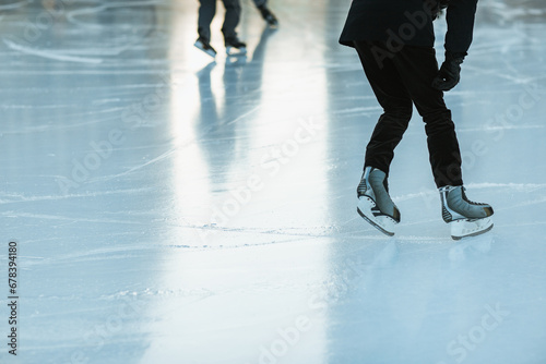 Winter leisure activity on a frosty ice rink photo
