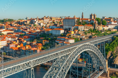 Porto, Portugal old town on the Douro River with famous Ponte Dom Luis bridge. Medieval architecture of Oporto downtown. Travel destination