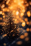 Golden Christmas tree with bokeh and glitter