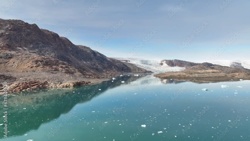 Aerial view of arctic glaciers and mountains in Greenland Aerial view of arctic glaciers and mountains in Greenland