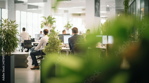 Business office in germany with blurred people casual wear, with blurred bokeh background. good atmosphere, many green plants, photo