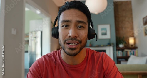 Man, face and video and call center for work from home, information and support or communication. Asian person in headphones, online meeting and listening for connection, advice or virtual contact photo