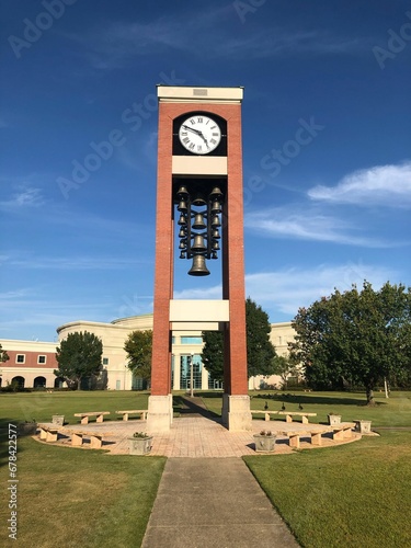 Shelton State Community College yard with a stone watch sculpture in Old Greensboro, Tuscaloosa, USA photo