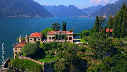 Aerial view of the luxury Villa Balbianello with terraced gardens, on the rocky wooded peninsula of Lavedo on Lake Como, panorama, picturesque residence. Green Planet. Nature. Lenno Italy 11.10.2023 photo