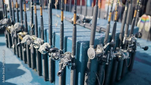 Fishing Rods Stacked Into Racks On A Tourist Fishing Boat photo