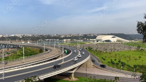 Cars driving on Hassan II bridge with a view over the Grand Theatre of Rabat in Morocco photo