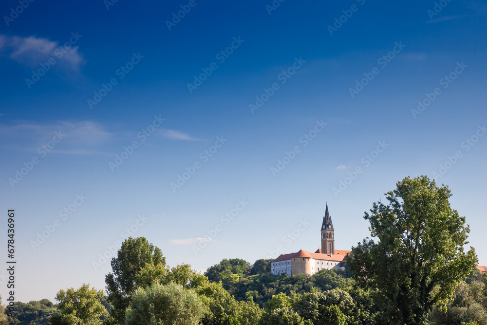 Panorama of Ilok castle (ilocka utvrda) with the the Sveti Ivan Kapistran church, in the franjevacki samostan convent. Ilok is the easternmost city of Croatia, in slavonia, a touristic landmark.