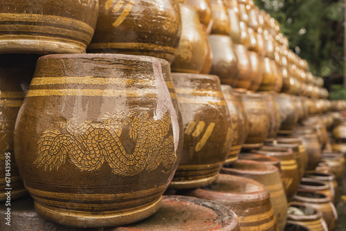 Finished stock of Thai-style dragon jars in Ratchaburi factory, Thailand photo