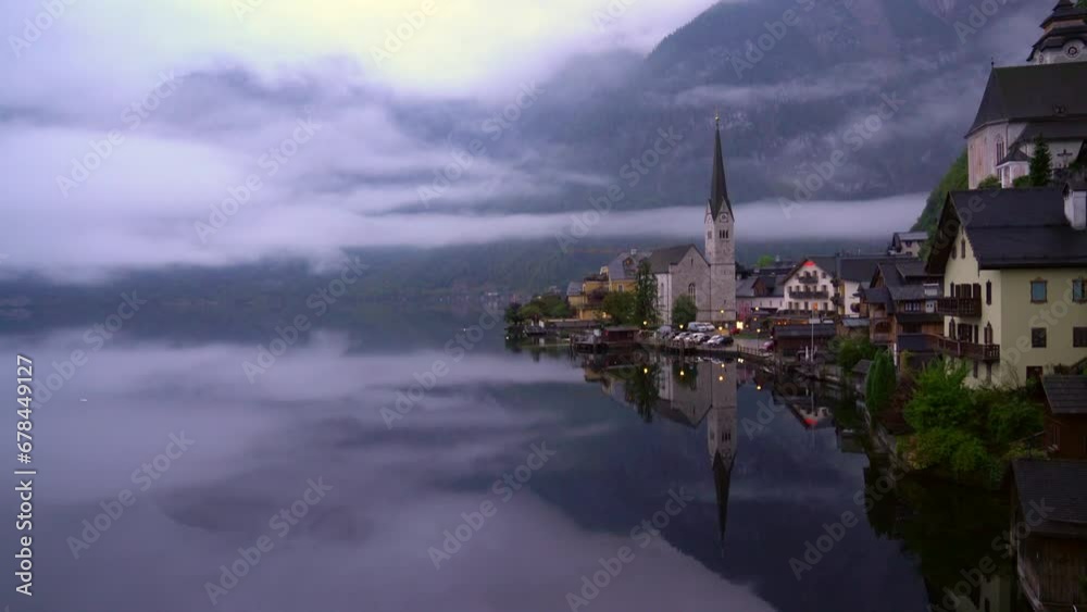 Hallstatt Village Salzkammergut Region Morning Austria 4K UHD. Morning mist at beautiful Hallstatt village on Hallstatter Lake in the Austrian Alps in the region of Salzkammergut, Austria. 4K, UHD.
Hallstatt Village Salzkammergut Region Morning Austria 4K UHD. Morning mist at beautiful Hallstatt village on Hallstatter Lake in the Austrian Alps in the region of Salzkammergut, Austria. 4K, UHD.