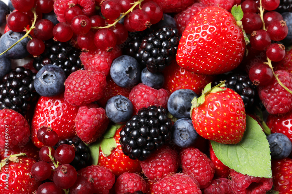 Different fresh ripe berries as background, top view Different fresh ripe berries as background, top view
