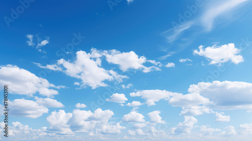 Blue skies and fluffy white clouds.