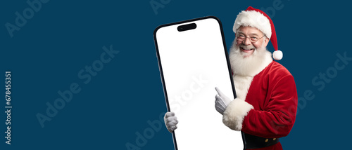 happy santa claus holding a giant smartphone with transparent screen png photo