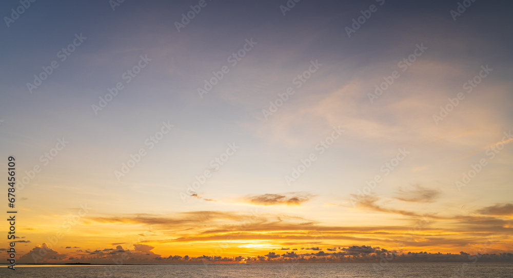 Abstract amazing Scene of stuning Colorful sunset or sunrise with clouds background in nature and travel concept, wide angle shot Panorama shot,Copy space.