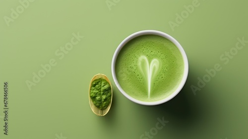 Cup of hot green tea on wooden table with nature background