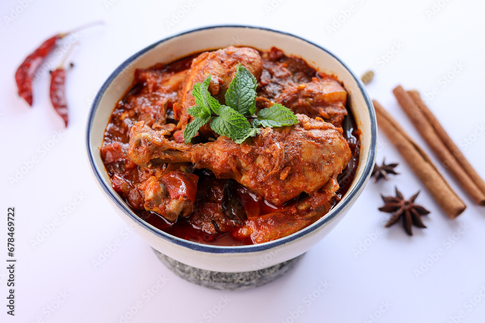 Spicy red chicken curry. Goan style chicken vindaloo. Butter chicken Murgh Makhani curry roast hot and spicy gravy dish Dhaba Punjab, India. North Indian non-vegetarian cuisine Garam Masala. tikka Spicy red chicken curry. Goan style chicken vindaloo. Butter chicken Murgh Makhani curry roast hot and spicy gravy dish Dhaba Punjab, India. North Indian non-vegetarian cuisine Garam Masala. tikka