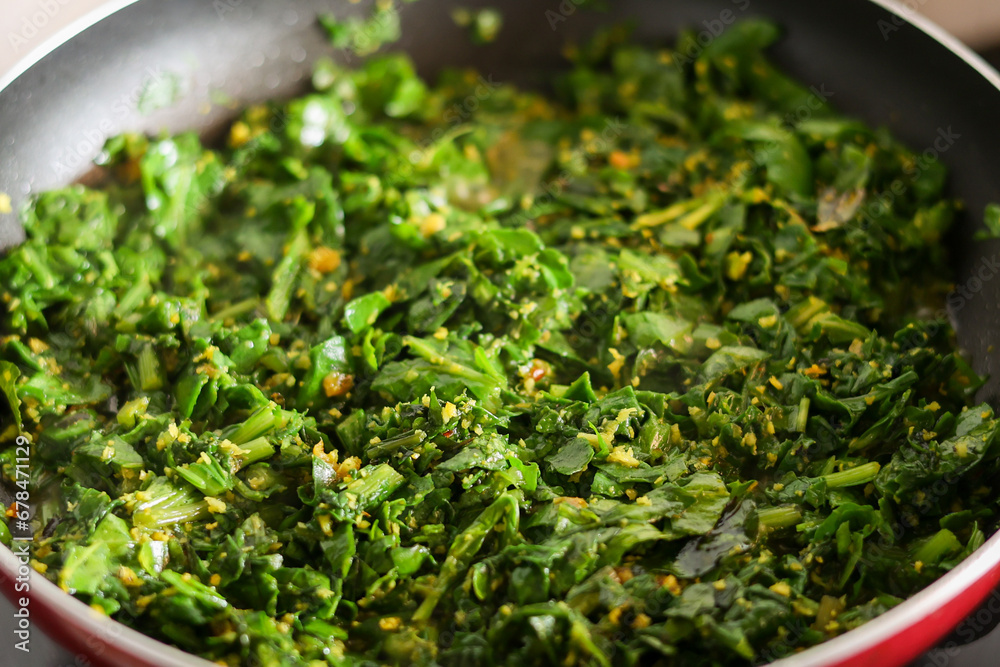 Palak and Moong dal sabzi. also known as spinach and lentil curry. Healthy green leafy