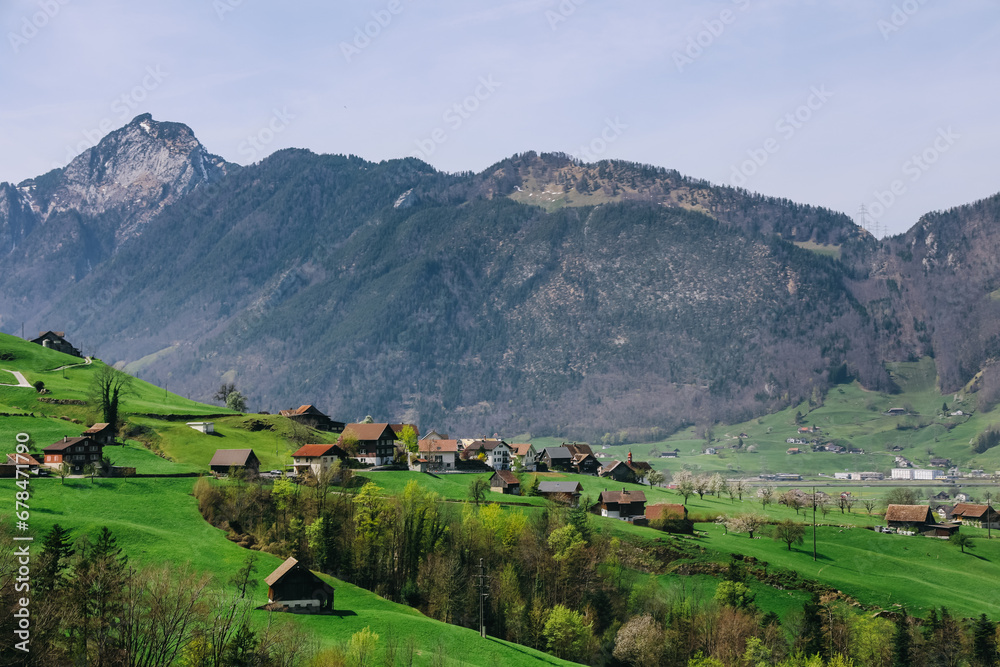 Scenic mountain village surrounded by the mountain, Canton Schwyz, Switzerland, Europe.
