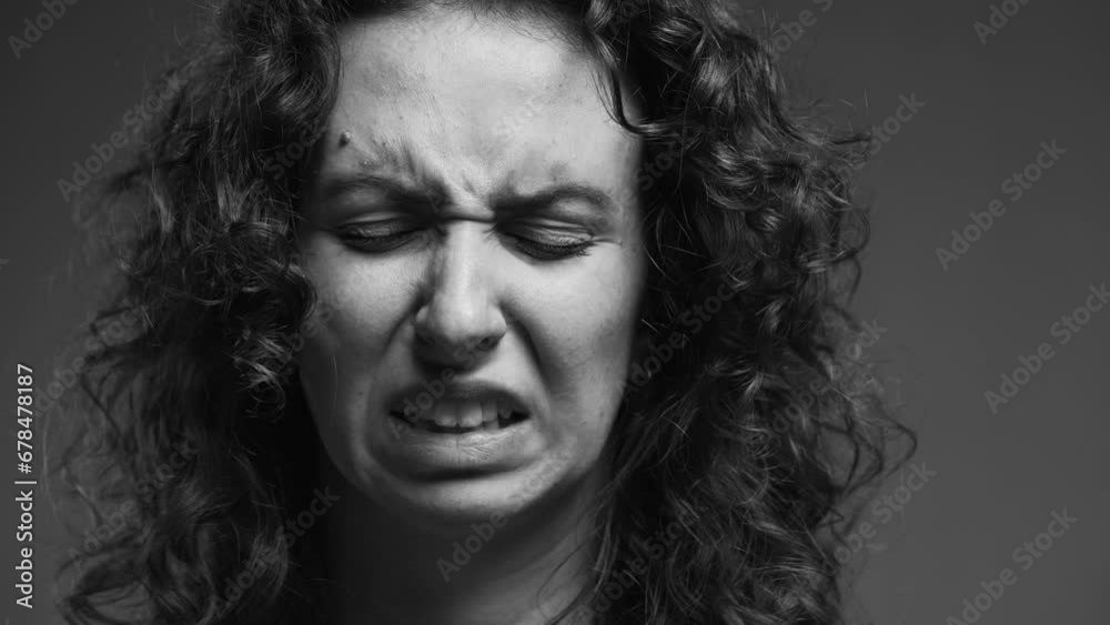 Woman Showing Strong Disgust, Intense Aversion Emotion, Dramatic Monochrome Close-up Woman Showing Strong Disgust, Intense Aversion Emotion, Dramatic Monochrome Close-up