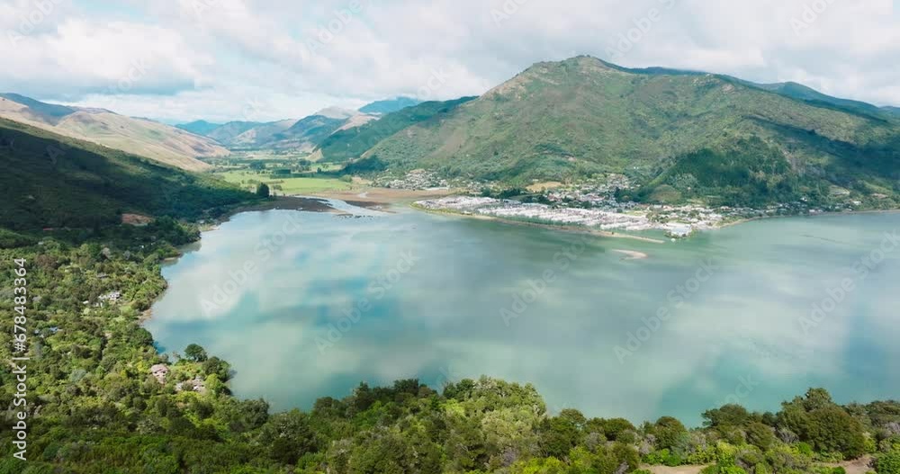 Aerial view of small town of Havelock nestled by the waters edge at head of Pelorus Sound in Marlborough Sounds, with calm, sheltered bay in the South Island of New Zealand Aotearoa Aerial view of small town of Havelock nestled by the waters edge at head of Pelorus Sound in Marlborough Sounds, with calm, sheltered bay in the South Island of New Zealand Aotearoa