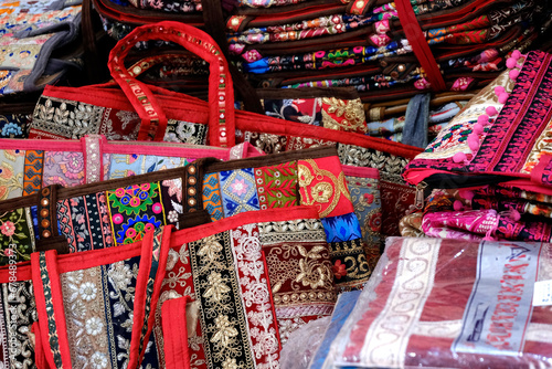 Colorful handcrafted cotton hand bags for sale in the local market., Pune, India.
