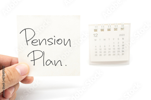 Desk calendar and Pension Plan Note Paper isolated on white background. For retirement, Pension Plan concept. Last date of work.