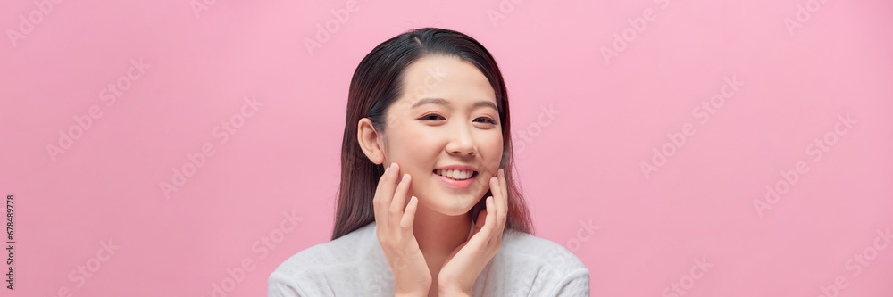 Banner of lovely young woman with healthy skin against pink background. Daily beauty routine Banner of lovely young woman with healthy skin against pink background. Daily beauty routine