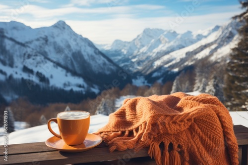 relaxes by mountain view with a cup of hot drink. Close up on feet.