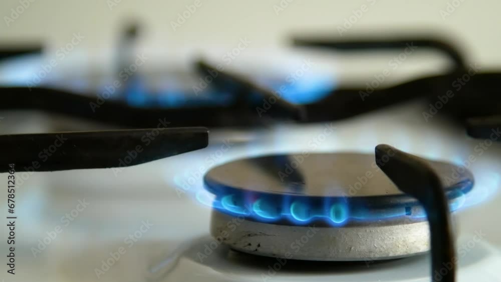 Gas burner. Combustion of domestic gas with impurities. Bad, dirty, poor quality gas burns on your home stove. Gas burner. Combustion of domestic gas with impurities. Bad, dirty, poor quality gas burns on your home stove.