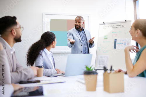 Presentation whiteboard, business people meeting and black man speech, report or teaching group, team or clients. Strategy planning, gesture or speaker explain project to listening professional staff photo