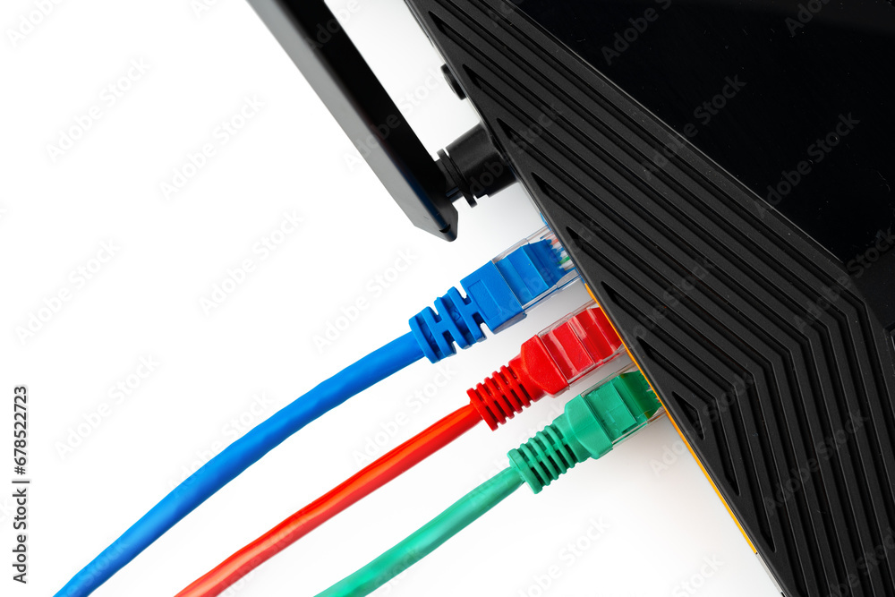 Modern router with cables plugged in close up Modern router with cables plugged in close up