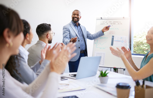 Training, success and black man with presentation in meeting for strategy and progress in startup. Business growth, coach and businessman teaching staff about planning, profit and applause for team