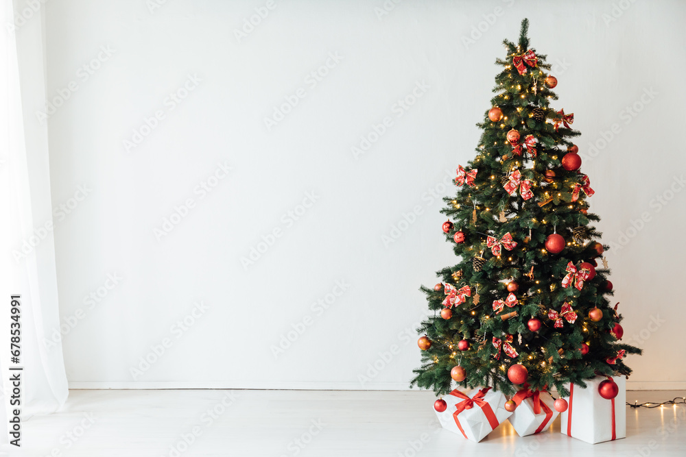 Interior christmas tree with gifts toys decorated new year Interior christmas tree with gifts toys decorated new year