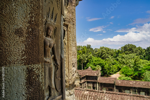 Apsara bas relief on the outer walls of the inner most sanctum at Angkor Wat temple at Siem Reap, Cambodia, Asia photo