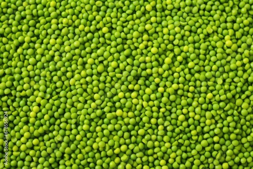 a mound of shiny, cooked green peas