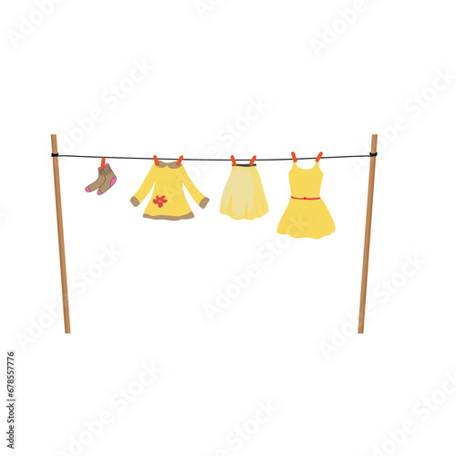 Clothes are dried on a line tied at both ends with sticks.