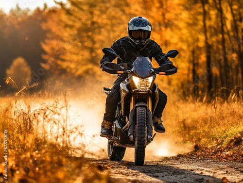 A motorcyclist cruising through scenic fall countryside, adventurous © Nate