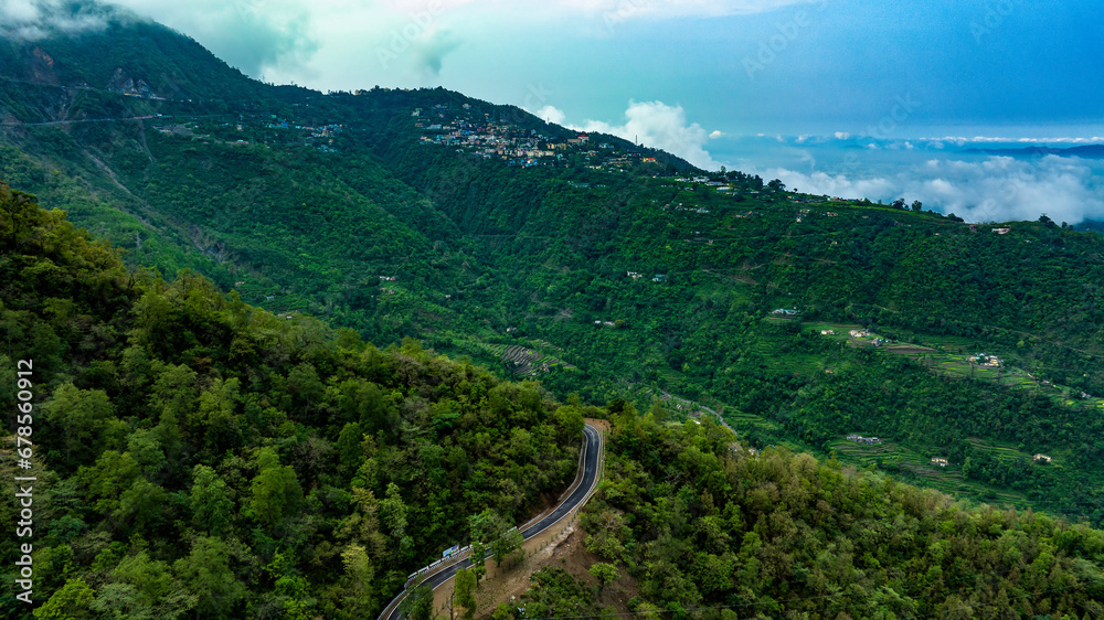 aerial view of a road in the mountains
