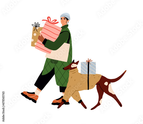 Woman and dog carrying Christmas gifts, present boxes on winter holidays. Hap...