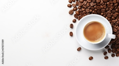 Hot espresso and coffee bean on white table with soft-focus and over light in the background.