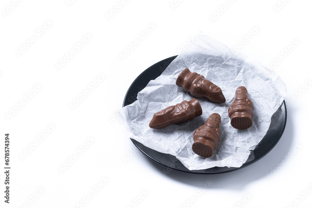 cheerful wrapped chocolate Santa Claus isolated on white background. Copy space cheerful wrapped chocolate Santa Claus isolated on white background. Copy space