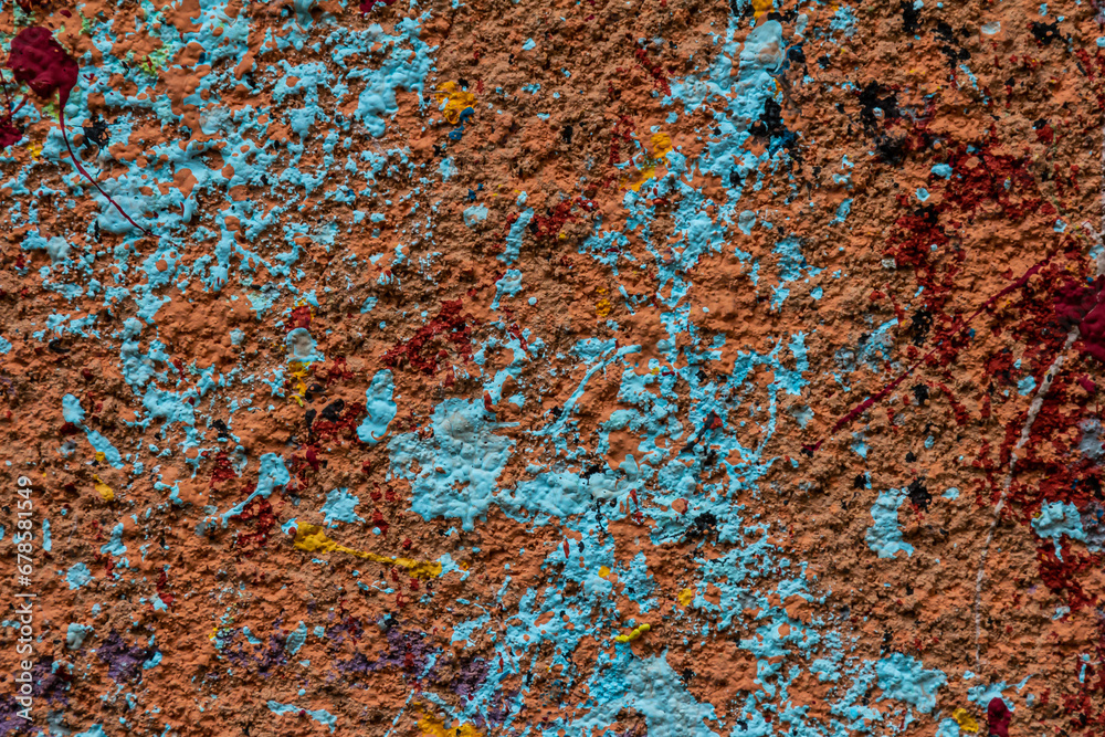 White plastered wall splattered with red paint. Paint splashes on the wall. Painted plaster wall. Abstract background. Painted plaster texture White plastered wall splattered with red paint. Paint splashes on the wall. Painted plaster wall. Abstract background. Painted plaster texture